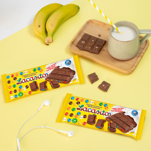 Молочный шоколад с драже из молочного шоколада в сахарной глазури 100 гр