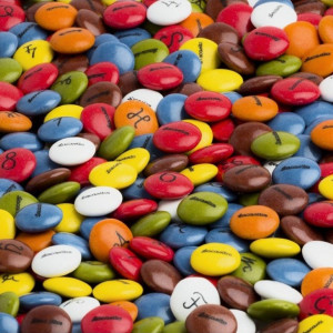 Драже из молочного шоколада в цветной сахарной глазури, Диспенсер и игрушка 150 гр