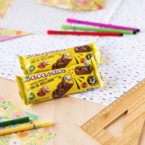 Злаковый батончик с начинкой из орехового масла с драже из молочного шоколада в сахарной глазури 2*23 гр