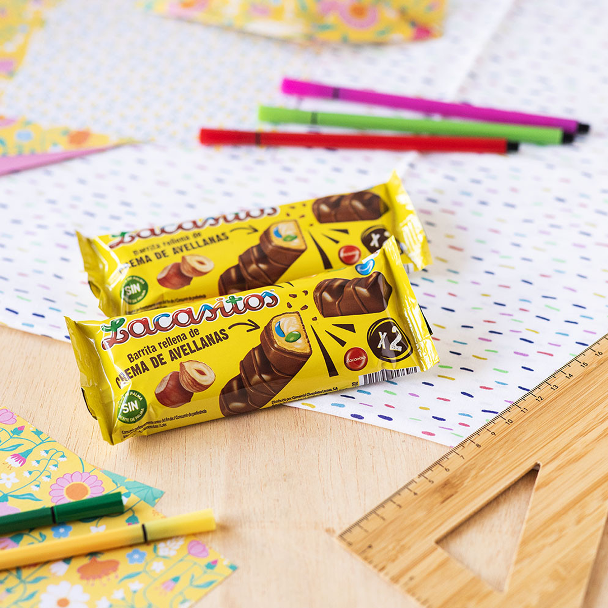 Злаковый батончик с начинкой из орехового масла с драже из молочного шоколада в сахарной глазури 2*23 гр